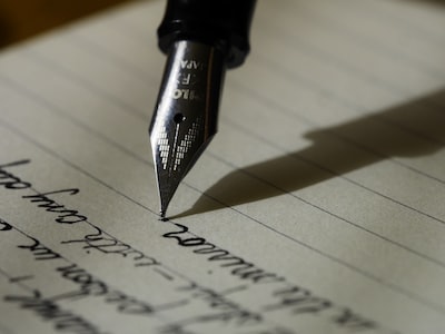 Writing a sentence.